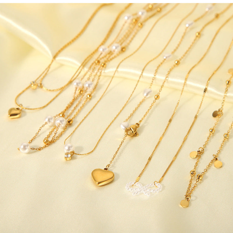 1107# Stainless steel heart-shaped pearl shell necklace women's light luxury tassel necklace jewelry